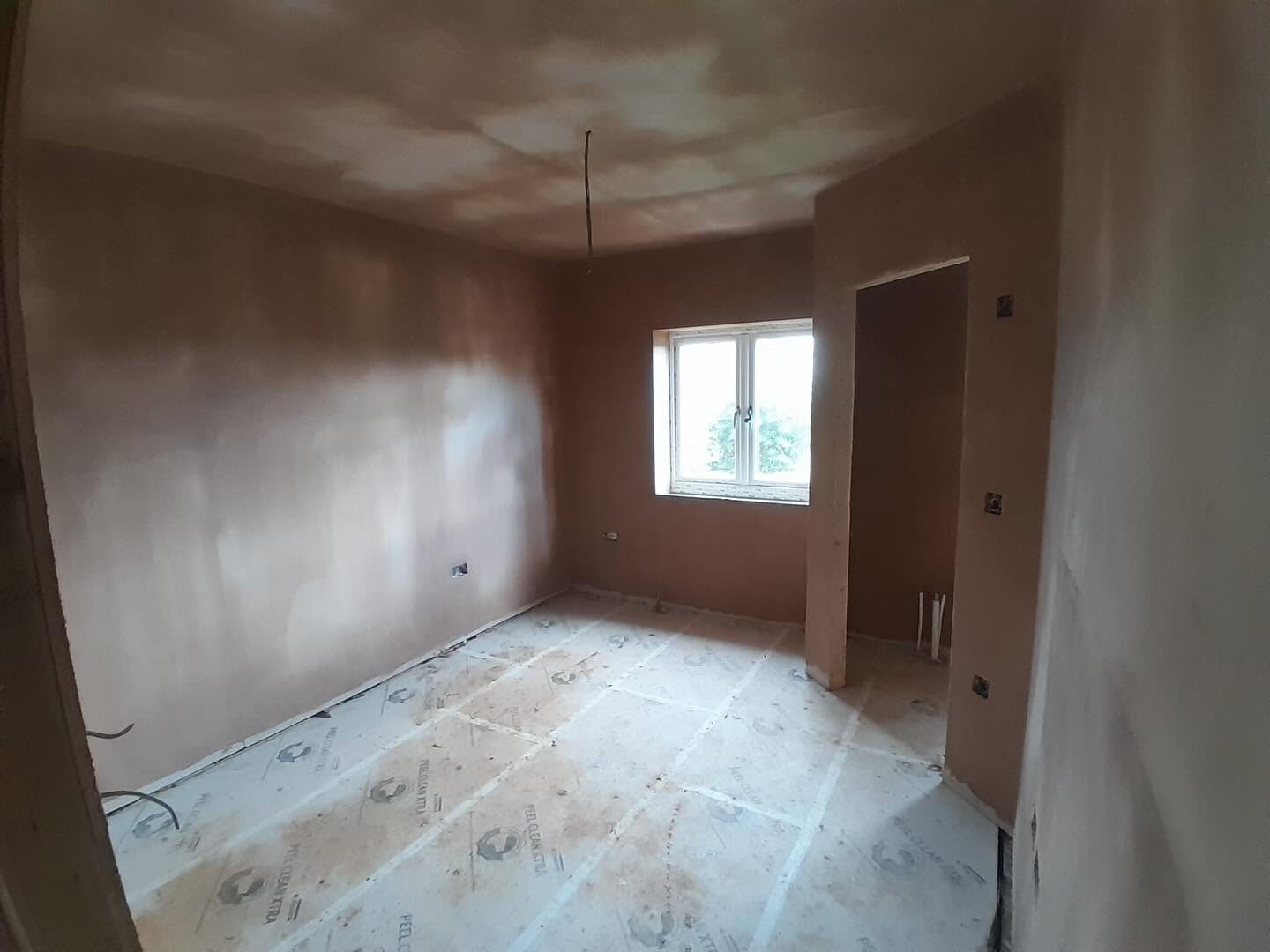 Bedroom walls and ceiling freshly skimmed